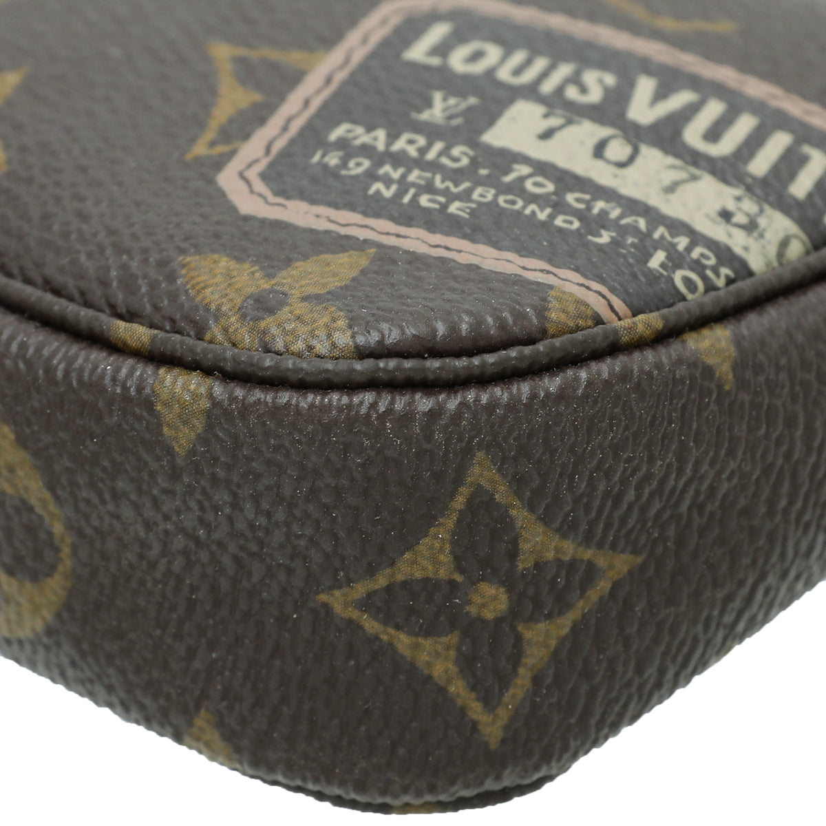 Louis Vuitton Monogram Travel Stamp Mini Pochette Accessoires