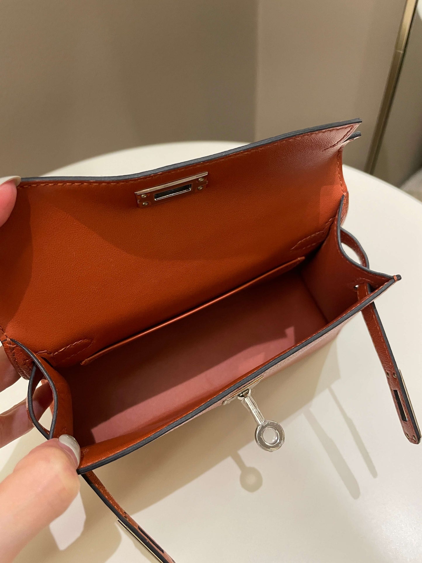 Hermes Mini Kelly 20 Cuivre Chèvre / Rose Mexico