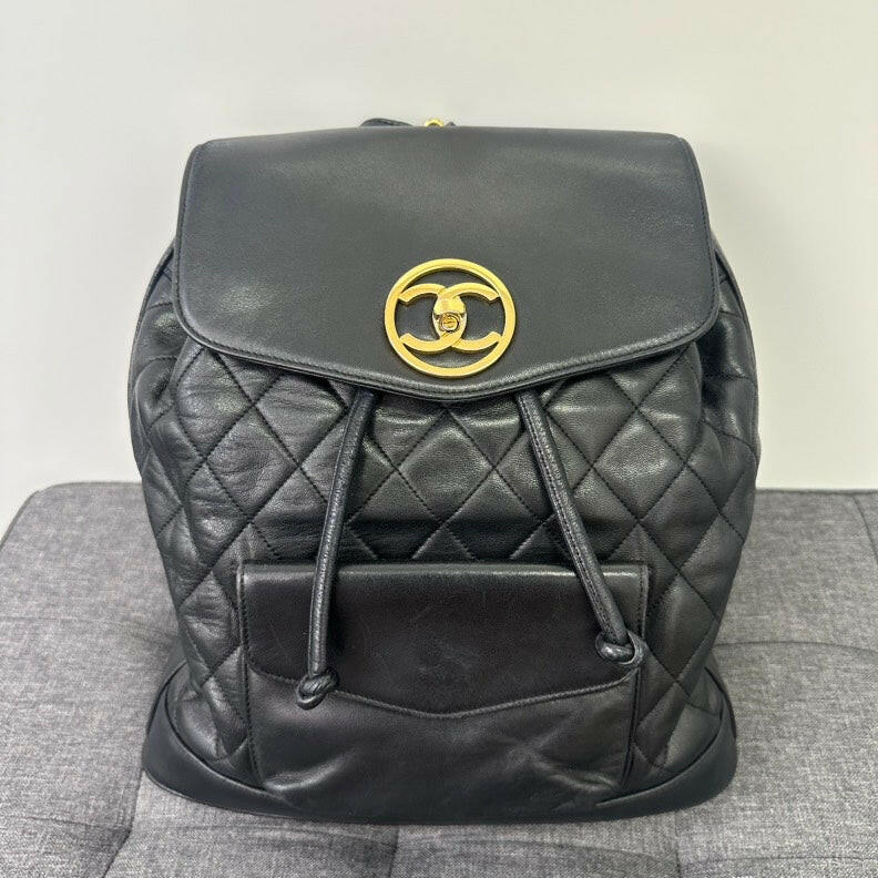 Chanel Vintage Black Lambskin Turn-lock Chain Backpack.